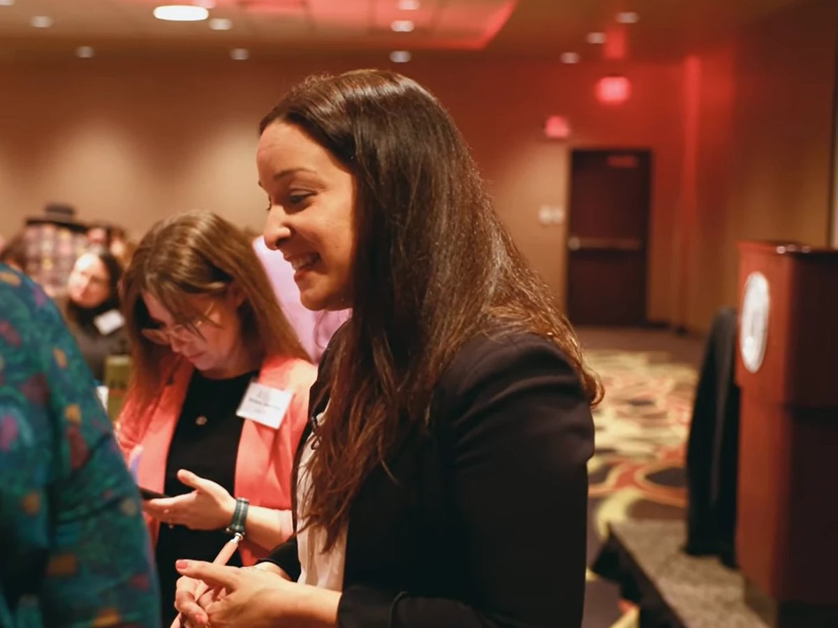 Alani coaching at a leadership event